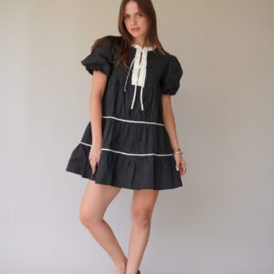 vestido negro moños al frente
